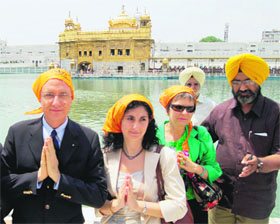 Italian Ambassador to India Daniele Mancini and his family members pay obeisance at the Golden Temple in Amritsar on Saturday