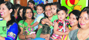 Children along with their mothers and teachers celebrate Mother's Day at Daddy's Teddy. 