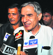 Former Railway Minister Pawan Kumar Bansal talks to mediapersons after arriving from Delhi at his residence in Sector 28, Chandigarh, on Saturday. 