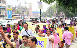 BTC teachers take out a protest march in support of their demands in Dehradun on Saturday. Tribune photo: Vinod Pundir