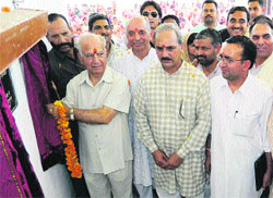 Rajya Sabha member Shanta Kumar dedicates to the people Ma Durga Vidya Mandir School at Indpur in the Palampur subdivision on Saturday. Photo: Rajiv Mahajan
