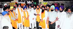PWD Minister Sharanjit Singh Dhillon and Speaker of the Vidhan Sabha Charanjit Singh Atwal while canvassing for votes at Katana Sahib