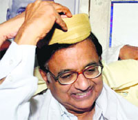 Union Finance Minister P Chidambaram wears a turban at the Bihar Congress Bhawan in Patna on Saturday.
