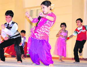 Children give a performance during the May Dance Festival - 2013 at SMD Little Champ School, Sector 2, in Panchkula on Sunday. 
