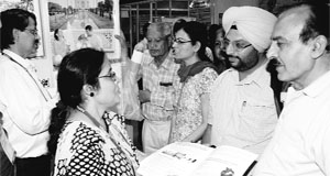Dr Gargi Sen from the Tea Board of India explains the tea preparation method to people at Arogya, a health mela, in Sector 17, Chandigarh on Sunday.