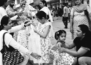Mothers purchase dresses for their children in Phase-VII, Mohali, on Sunday.