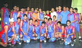 Winners of the 13th Aspen Crew Uttarakhand State Junior (U-18) Basketball Championship played at Welham School in Dehradun strike a pose with the winners trophies