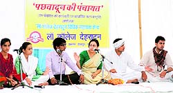 Students of Law College give a presentation during a legal awarness camp held at Sahaspur in Dehradun on Sunday