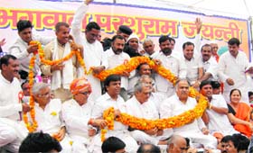 (Third from right) Speaker Kuldeep Sharma and former Union minister Venod Sharma (sitting next to the Speaker) at a Parshuram Jayanti function at Bhiwani on Sunday