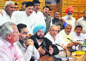 Former Punjab Chief Minister Capt Amarinder Singh addresses a press conference in Shimla on Sunday
