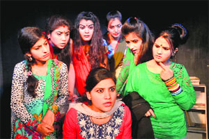 Artistes present Hindi play Rehearsal in Jammu on Sunday. 