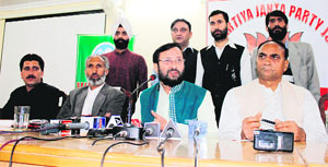 BJP national spokesman Prakash Javedekar addresses a press conference in Srinagar on Sunday. 