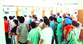People queue up at Suwida Centre located at the DC office complex in Amritsar.