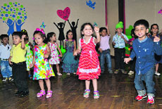 Students of Small Wonder School present a dance item to mark Mothers Day. 