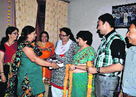 State BJP womens wing chief Neelam Sehgal meets party workers in Haridwar on Monday. 