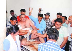 Sukhchain, former sarpanch of Kaluwas village, undergoes treatment at the General Hospital in Bhiwani