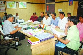 Additional Deputy Commissioner SB Lohia inquires into the complaints of alleged embezzlement at a meeting in Sonepat