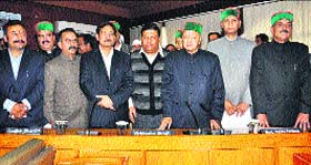 Chief Minister Virbhadra Singh and state Congress chief Sukhvinder Singh with newly inducted Chief Parliamentary Secretaries in Shimla on Monday