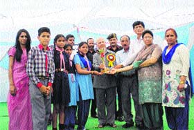 Shanta Kumar, MP, distributes prizes during the golden jubilee celebration of Kendriya Vidyalaya, Palampur, on Monday