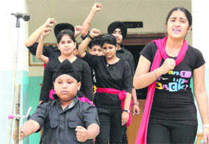 Students of MGN Public School participate in Nukkad Natak in Jalandhar on Monday.