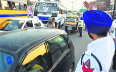 Commuters had to bear the brunt as there was a blockade at Aarti Chowk in Ludhiana on Monday. 