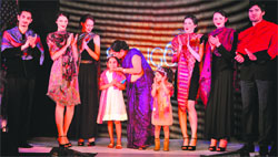 Mridula Jain (centre), owner of Shingora Textiles, showcases the newly launched luxury collection in Ludhiana. 
