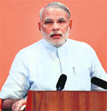 Gujarat CM Narendra Modi addressing Non-Resident Gujaratis across 20 cities in the USA on Monday via video link in Gandhinagar.