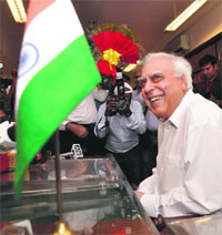 Kapil Sibal takes charge of the Law Ministry in New Delhi on Monday. 