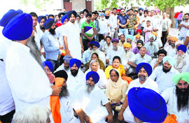 SAD leaders address an election meeting at Devinagar village in Rajpura on Monday.
