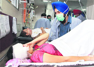 One of the injured women being treated at a private hospital in Jalandhar on Monday