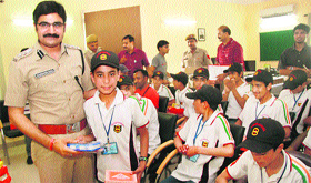 Students from the Drass and Kargil areas meet Maheshwar Dayal, DCP (East), Gurgaon, during a sadbhavna tour on Tuesday.