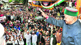 Virbhadra Singh waves to people at Bharmour on Tuesday.