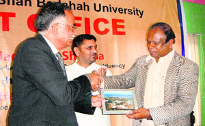 MP Madan Lal Sharma  with John Samuel, Chief Postmaster General of the state,  at Baba Ghulam Shah Badshah University in Jammu on Tuesday. 