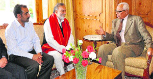 Governor NN Vohra  during a meeting with NPP delegation at the Raj Bhawan in Srinagar on Tuesday. 