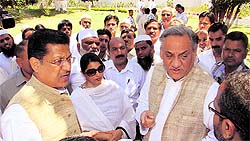 A delegation of Muslims, led by vice-president of the state unit of the Congress Suryakant Dhasmana, meets Chief Minister Vijay Bahuguna at the latters residence in Dehradun on Wednesday