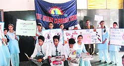 Holding placards, students of The Indian Cambridge School spread awareness about cleanliness at the Dehradun railway station on Wednesday