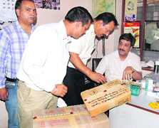 Officials of the district Health Department conduct a raid on a clinic, run by a retired pharmacist, on Ladowali Road at Preet Nagar in Jalandhar on Wednesday.