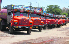 Water tankers parked outside the PHE office at BC road in Jammu on Wednesday.