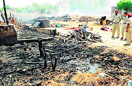 The debris left after two jhuggis caught fire near Gurdwara Nanaksar on the Ludhiana-Moga highway. 