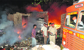 A fire rages at a slum in the Sanauri Adda area in Patiala on Thursday night.