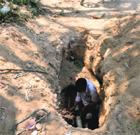 Work on a water pipeline under way despite the election code of conduct being in force at Badhmajra village near Balongi barrier in Mohali on Thursday.