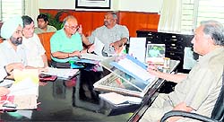 Chief Minister Vijay Bahuguna presides over a meeting on the Annual Plan 2013-14 in Dehradun on Thursday