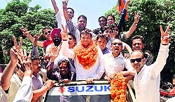Newly elected president of the BJYM Uttarakhand Saurabh Thapliyal along with his supporters in Dehradun on Wednesday