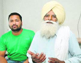 Farmer Pargat Singh and his nephew Gurpreet Singh, who were allegedly  kept in illegal custody by the Kartarpur police, in Jalandhar. 