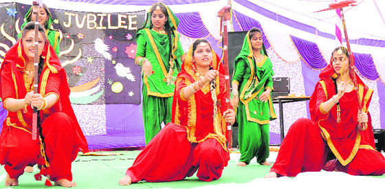 Students of Kendriya Vidyalaya No 2 perform a dance during the celebration of the golden jubilee of the school at the Rail Coach Factory in Kapurthala on Thursday. 