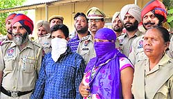 Drug peddlers being taken to a court in Ludhiana on Thursday