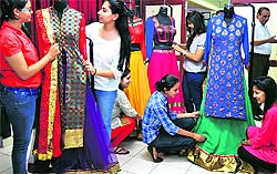 Students display dresses during the pre-exhibition event of the Sportking Institute of Fashion Technology in Ludhiana