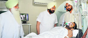 Rajwinder Singh, a gunshot victim, at a hospital in Ludhiana on Thursday. 