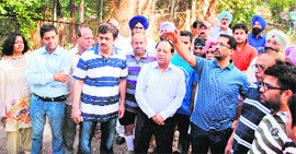 Punjab Industry Minister Anil Joshi (third from right), Mayor Bakshi Ram Arora (C) at the historic Company Bagh in Amritsar on Friday.