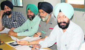 Members of the Guru Nanak Dev University Teacher Association in Amritsar on Friday.